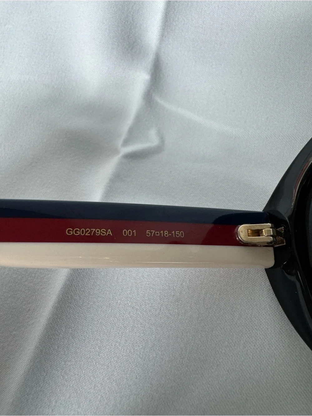 Gucci Black Oval Women's Sunglasses with Navy Temples